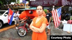 Anida Yoeu Ali with her Studio Revolt crew in production for The Buddhist Bug series. Here she stands in front of Java Cafe and Gallery in Phnom Penh, Cambodia, June 25, 2015. (Courtesy photo/Masahiro Sugano)