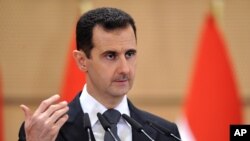 ဆီးရီးယားသမ္မတ ဘက်ရှာအယ်လ်အာဆတ် (Bashar al-Assad)။