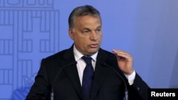 FILE - Hungarian Prime Minister Viktor Orban delivers a speech in Budapest, Hungary, Sept. 7, 2015. 
