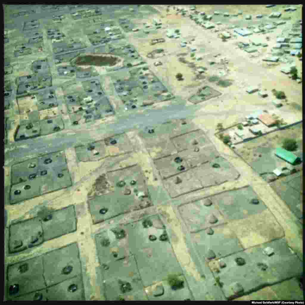 An aerial shot taken over Leer in Unity state, South Sudan, shows many tukuls burnt to the ground.