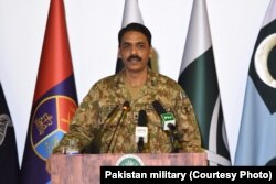 FILE - Major General Asif Ghafoor addresses a press conference on July 16, 2017. Military's media wing ISPR has released the photo to news organizations, including VOA.