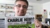 Un an après l'attentat, Charlie Hebdo met un Dieu assassin à la Une