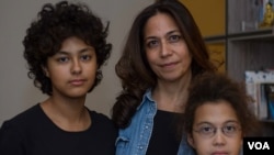 Hala Bejjani and her two daughters Yasmina (left) and Leila. Hala is hopeful that change will come eventually, and she will be able to pass on her citizenship to her children. (VOA/J. Owens).