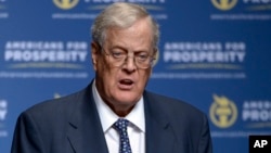 FILE - Americans for Prosperity Foundation Chairman David Koch speaks in Orlando, Fla., Aug. 30, 2013. David Koch and his brother Charles plan to spend millions to promote the recently signed tax overhaul.