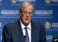 FILE - Americans for Prosperity Foundation Chairman David Koch speaks in Orlando, Fla., Aug. 30, 2013. David Koch and his brother Charles plan to spend millions to promote the recently signed tax overhaul. FILE - Americans for Prosperity Foundation Chairman David Koch speaks in Orlando, Fla., Aug. 30, 2013.