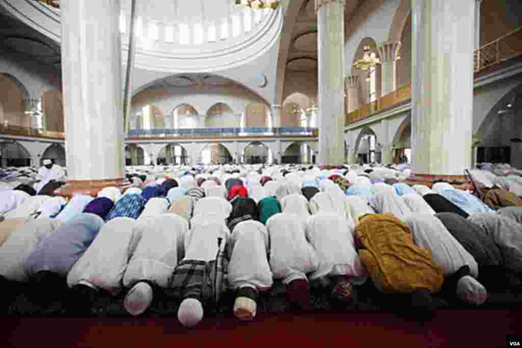 Nigeria Muslim offers prayers during Eid at the central mosque in Abuja, Nigeria, Aug. 30, 2011. AP