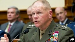 FILE - Marine Corps Commandant Gen. Robert B. Neller testifies on Capitol Hill in Washington, April 5, 2017, before the House Armed Services Committee hearing.