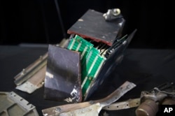 FILE - The remains of an Iranian rocket's Qiam guidance component which was fired by Yemen into Saudi Arabia, according to U.S. Ambassador to the U.N. Nikki Haley during a press briefing at Joint Base Anacostia-Bolling, Dec. 14, 2017, in Washington.