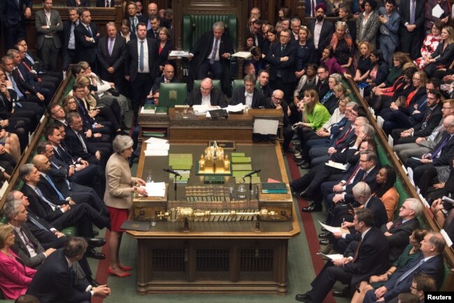 British Prime Minister Theresa May speaks at the House of Commons in London, March 29, 2019.