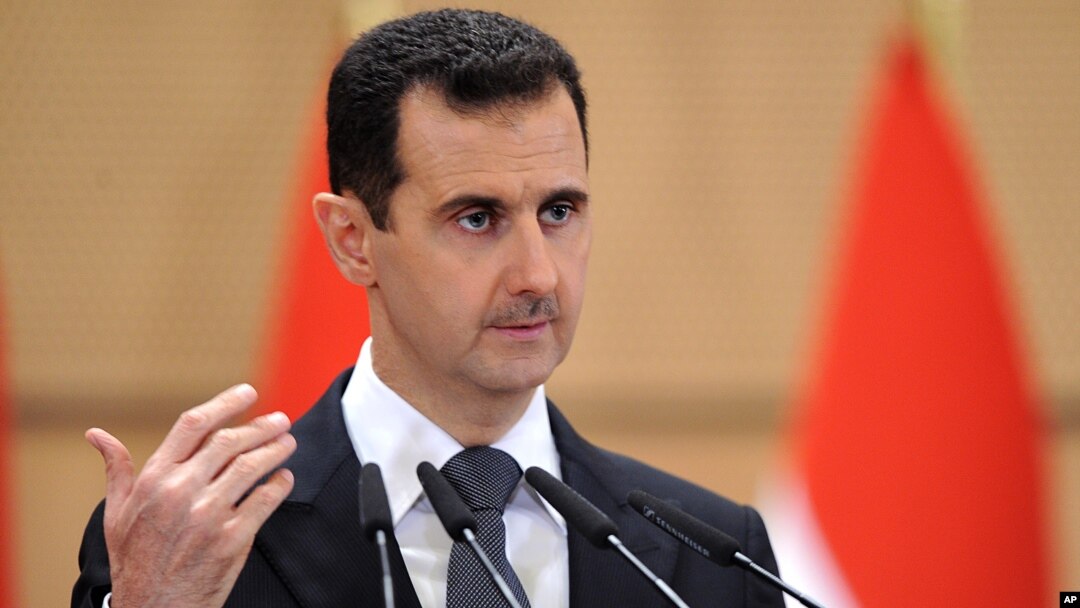 In this photo dated June 20, 2011 and released by the Syrian official news agency SANA, Syrian President Bashar Assad delivers a speech in Damascus, Syria, at Damascus University. 