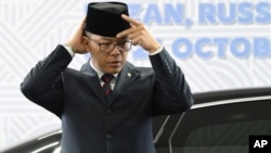 FILE - Indonesian Foreign Minister Sugiono arrives at the BRICS summit in Kazan, Russia, Oct. 24, 2024. 