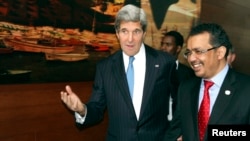 U.S. Secretary of State John Kerry (L) and Ethiopian Foreign Minister Tedros Adhanom walk after their joint news conference in Addis Ababa May 25, 2013