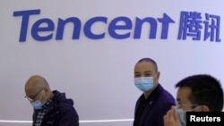 FILE - A logo of Tencent is seen during the World Internet Conference in Wuzhen, Zhejiang province, China, Nov. 23, 2020. 