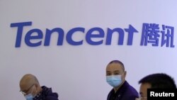 FILE - A logo of Tencent is seen during the World Internet Conference in Wuzhen, Zhejiang province, China, Nov. 23, 2020. 