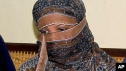 Pakistan's Supreme Court overturns, Oct. 31, 2018, the 2010 conviction against Christian woman Asia Bibi for insulting Islam's Prophet Muhammad. After eight years on death row for blasphemy Bibi plans to leave the country, her family said.