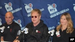 From left to right: Andre Agassi, Elton John, and Steffi Graf at news conference