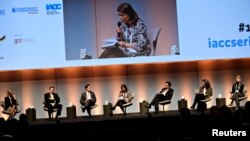 Development officials participate in the opening debate at the International Anti-Corruption Conference at the Bella Centre in Copenhagen, Denmark, Oct. 22, 2018.