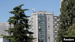 FILE - Housing blocks are seen in the Paris suburb of Saint-Denis, France. 