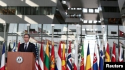 U.S. Secretary of State Antony Blinken delivers an address after a meeting of NATO foreign ministers at NATO headquarters in Brussels, Belgium, March 24, 2021. 