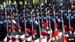 Spanish troops march during the Spanish National Day military parade in Madrid.