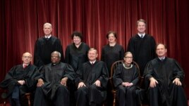 The justices of the U.S. Supreme Court gather for a formal group portrait at the Supreme Court Building in Washington, Nov. 30, 2018.