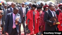 First Lady Grace Mugabe and Vice President Joice Mujuru graduated with PhDs at the University of Zimbabwe on Friday. (Courtesy photo)