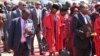 UNkosikazi Grace Mugabe lomsekeli kaMongameli welizwe uNkosikazi Joice Mujuru basanda kuthola izicoco zePhDs ekolitshini le University of Zimbabwe on Friday. (Courtesy photo)