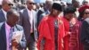 UNkosikazi Grace Mugabe and lomsekeli kamongameli uNkosikazi Joice Mujuru ngelanga bethola izicoco ze PhDs at the University of Zimbabwe on Friday. (Courtesy photo)