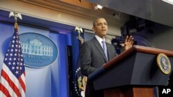 FILE - President Barack Obama makes a statement to reporters in the Brady Press Briefing Room at the White House.