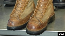 VOA correspondent Steve Herman's boots before being repaired after almost 25 years of wear. (Steve Herman/VOA) 