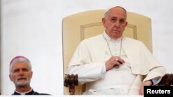 Pope Francis leads his weekly general audience in Saint Peter's Square at the Vatican, Nov. 12, 2014. 