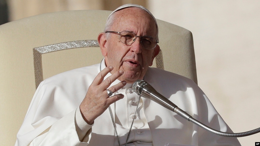 FILE - Pope Francis speaks during his weekly general audience in St. Peter square at the Vatican, Nov. 22, 2017. 
