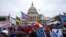 FILE - People attack the U.S. Capitol in Washington on Jan. 6, 2021.