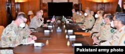 CENTCOM chief Gen. Kenneth “Frank” McKenzie meets in Pakistan with Pakistani military chief Gen. Qamar Javed Bajwa, Sept. 11, 2020. (Pakistani army photo)