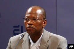 FILE—Mohamed Ibn Chambas attends a media conference at the EU Foreign Ministers meeting in Valkenburg, the Netherlands, September 4, 2004.