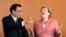 German Chancellor Angela Merkel and China's Premier Li Keqiang joke prior to a meeting at the Chancellery in Berlin, Germany, May 31, 2017.