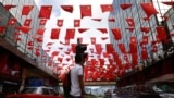 Chinese and Hong Kong flags are seen ahead of 20th anniversary of the handover from Britain to China, in Hong Kong, June 27, 2017.