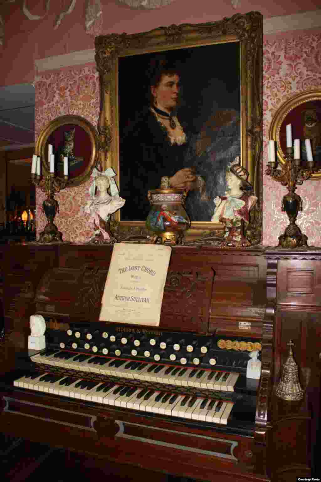 An organ, an anitquie piano and an 1894 mandolin grace the music room. Love says, &quot;It was everybody&rsquo;s duty to be able to play a musical instrument.&quot; &nbsp;Photo by Darren Taylor.