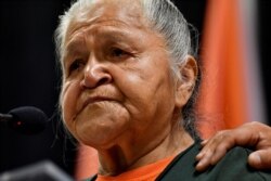 FILE - Residential school survivor Evelyn Camille speaks at a presentation of the findings on 215 unmarked graves discovered at Kamloops Indian Residential School in Kamloops, British Columbia, Canada, July 15, 2021.