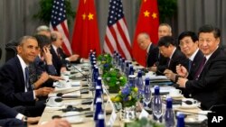 President Barack Obama meets with Chinese President Xi Jinping during the Nuclear Security Summit in Washington, March 31, 2016. (AP Photo/Jacquelyn Martin)