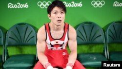 Japanese gymnast Kohei Uchimura pauses during a workout at the Rio Olympic Arena in Rio de Janeiro, Aug. 3, 2016. 