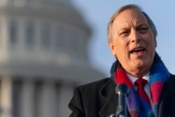 FILE - Rep. Andy Biggs, R-Ariz., speaks on Capitol Hill, Dec. 3, 2020.