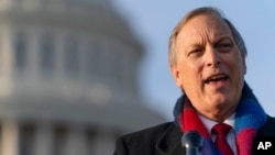 FILE - Rep. Andy Biggs, R-Ariz., speaks on Capitol Hill, Dec. 3, 2020.