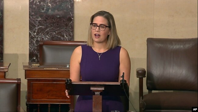 FILE - In this image from Senate Television, Sen. Kyrsten Sinema, D-Ariz., speaks on the floor of the U.S. Senate on Jan. 13, 2022.