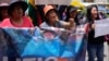 Manifestantes gritan consignas antigubernamentales para protestar contra los contratos de explotación de litio con empresas rusas y chinas en La Paz, Bolivia, el jueves 13 de febrero de 2025. AP