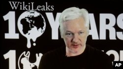 FILE - WikiLeaks founder Julian Assange participates via video link at a news conference marking the 10th anniversary of the anti-secrecy group, in Berlin, Germany, Oct. 4, 2016.