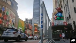 Crowd barriers are in place around Macy's as preparations continue for the Macy's Thanksgiving Day Parade in New York, Nov. 23, 2016. More than 80 New York City sanitation trucks filled with sand will be used along the route to create a physical barrier to would-be terrorist attackers.
