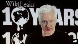 WikiLeaks founder Julian Assange participates via video link at a news conference marking the 10th anniversary of the anti-secrecy group, in Berlin, Germany, Oct. 4, 2016.
