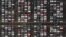FILE - An aerial view shows lines of new Honda cars parked up at the Royal Portbury Dock in Avonmouth, near Bristol in south-west England, Dec. 4, 2020. The absence of a Brexit deal would alter the once almost seamless trade between the UK and the EU.