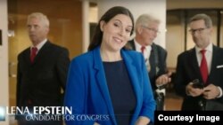 Michigan Republican candidate Lena Epstein against a backdrop of skeptical men in a screenshot from a campaign television ad.